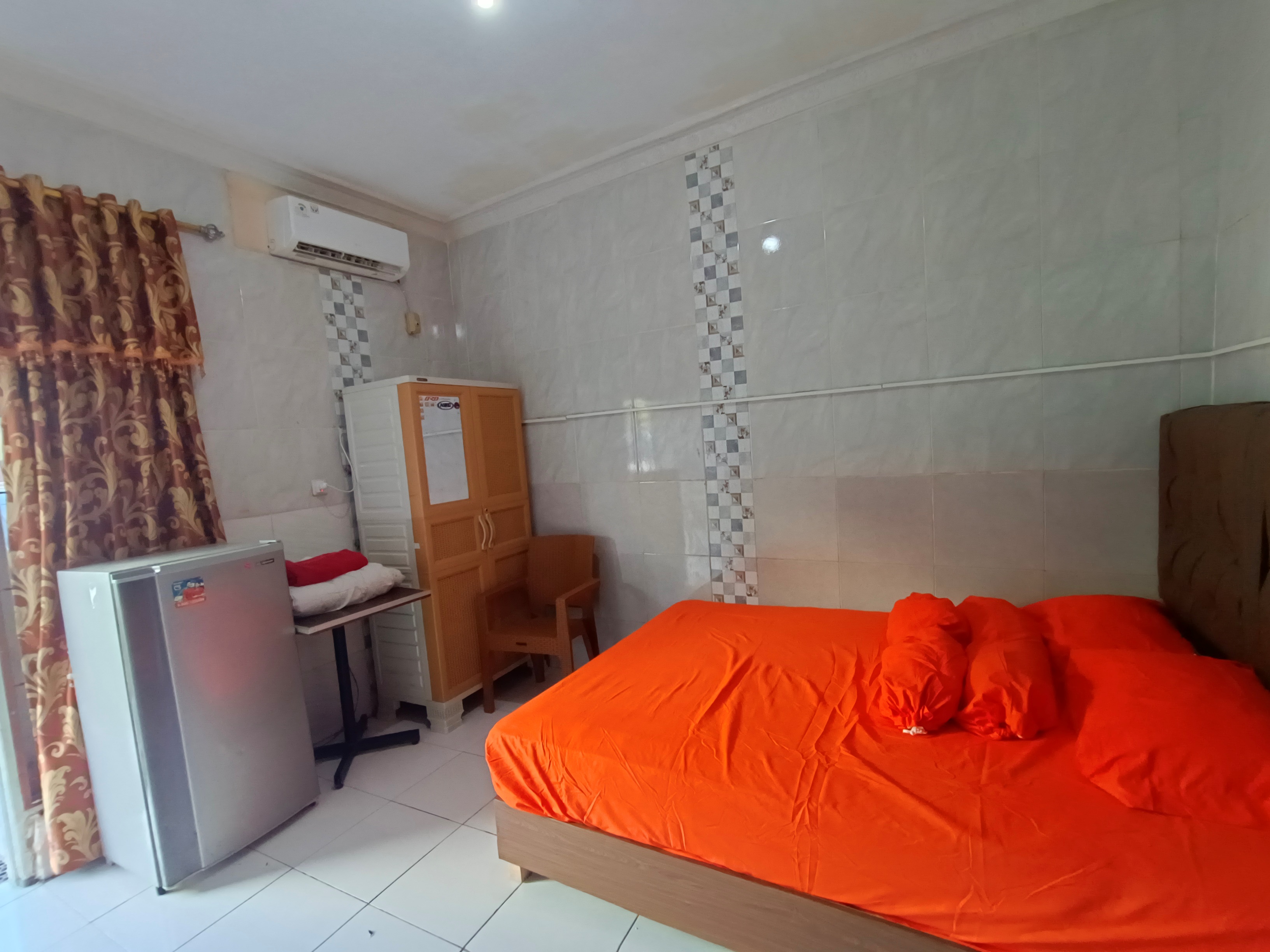 Kamar 105E